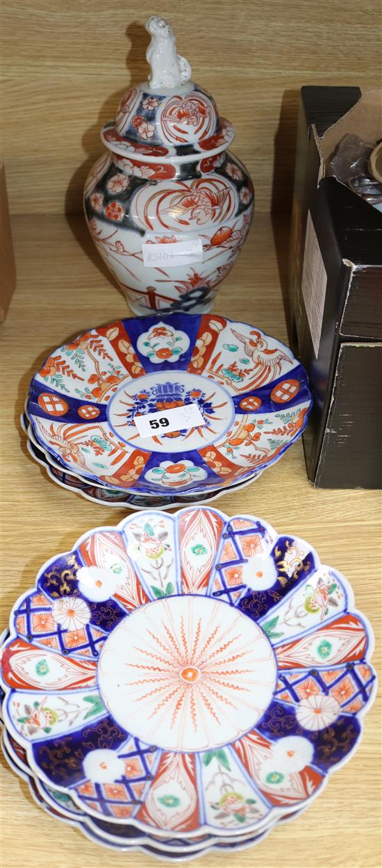 Six Imari plates, 21cm and a vase and cover, 27cm